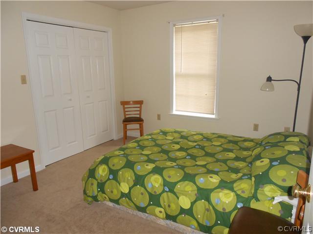 151 Sunset Ridge Drive Farmville, VA 23901 - Photo 6 of 12 a bedroom with a bed and a window