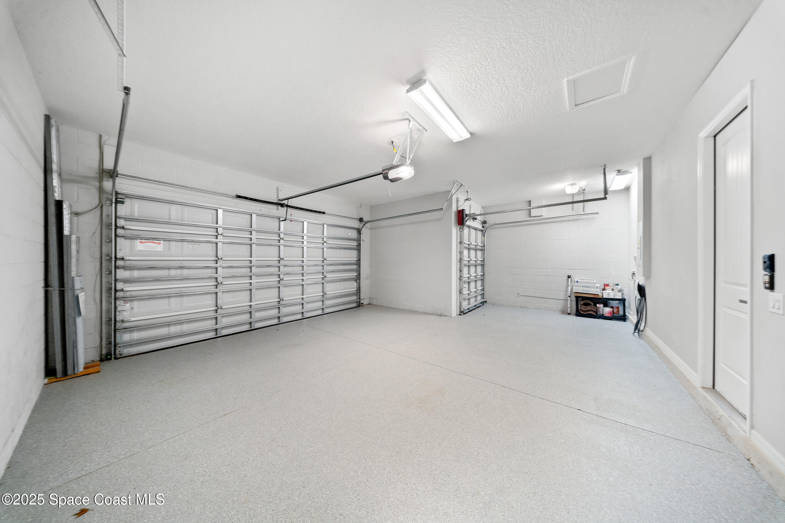 8830 Napolo Drive Melbourne, FL 32940 - Photo 25 of 36 a view of a garage