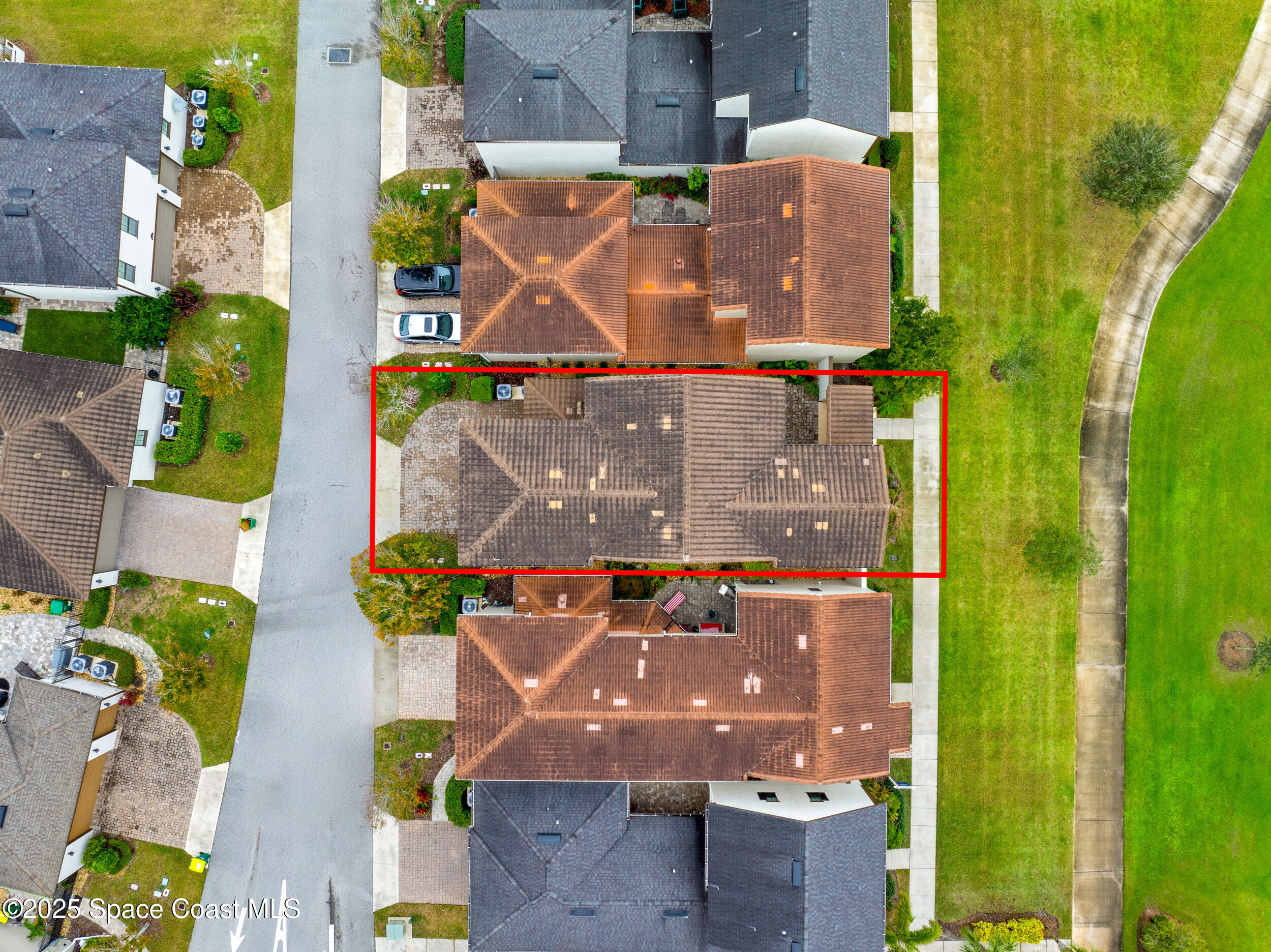 8830 Napolo Drive Melbourne, FL 32940 - Photo 31 of 36 an aerial view of residential houses with outdoor space