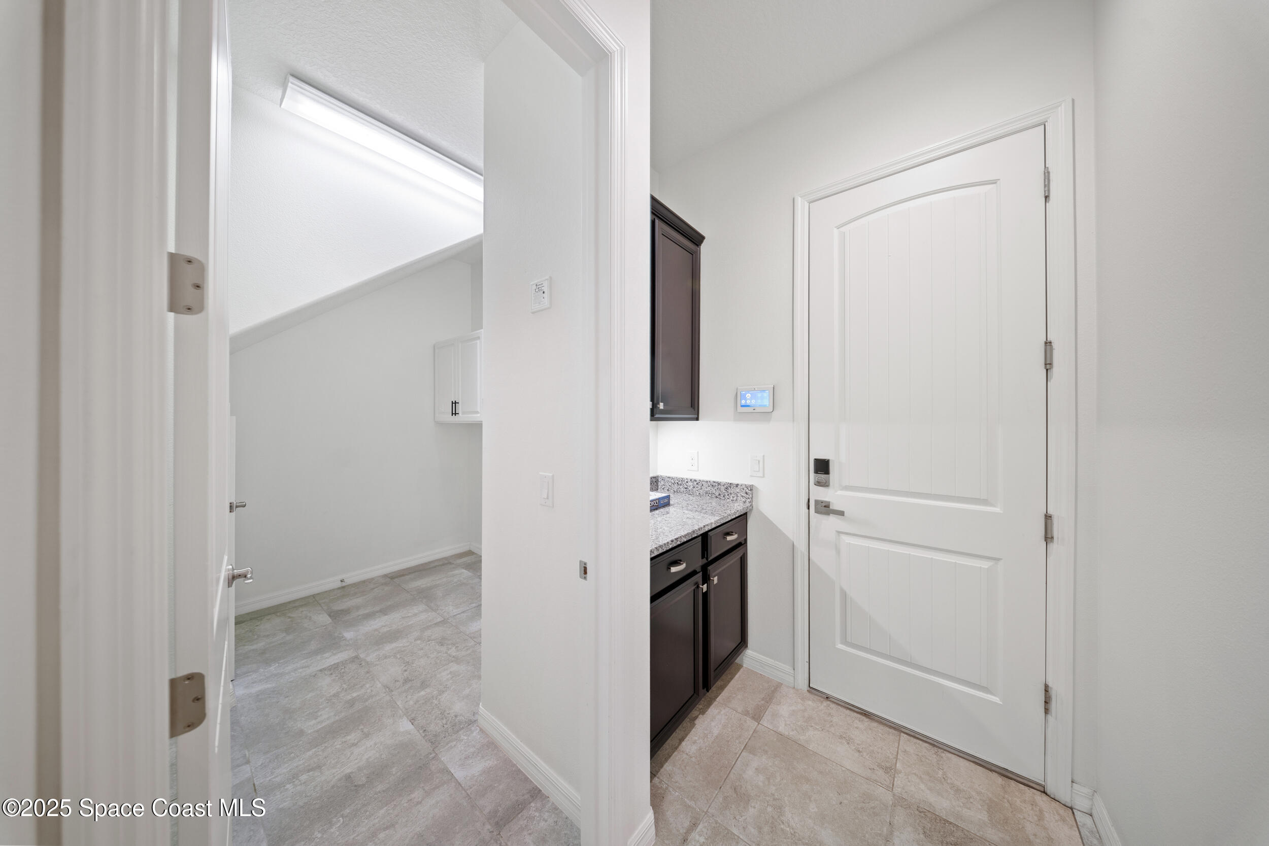 8830 Napolo Drive Melbourne, FL 32940 - Photo 8 of 36 a view of a kitchen cabinets and a sink