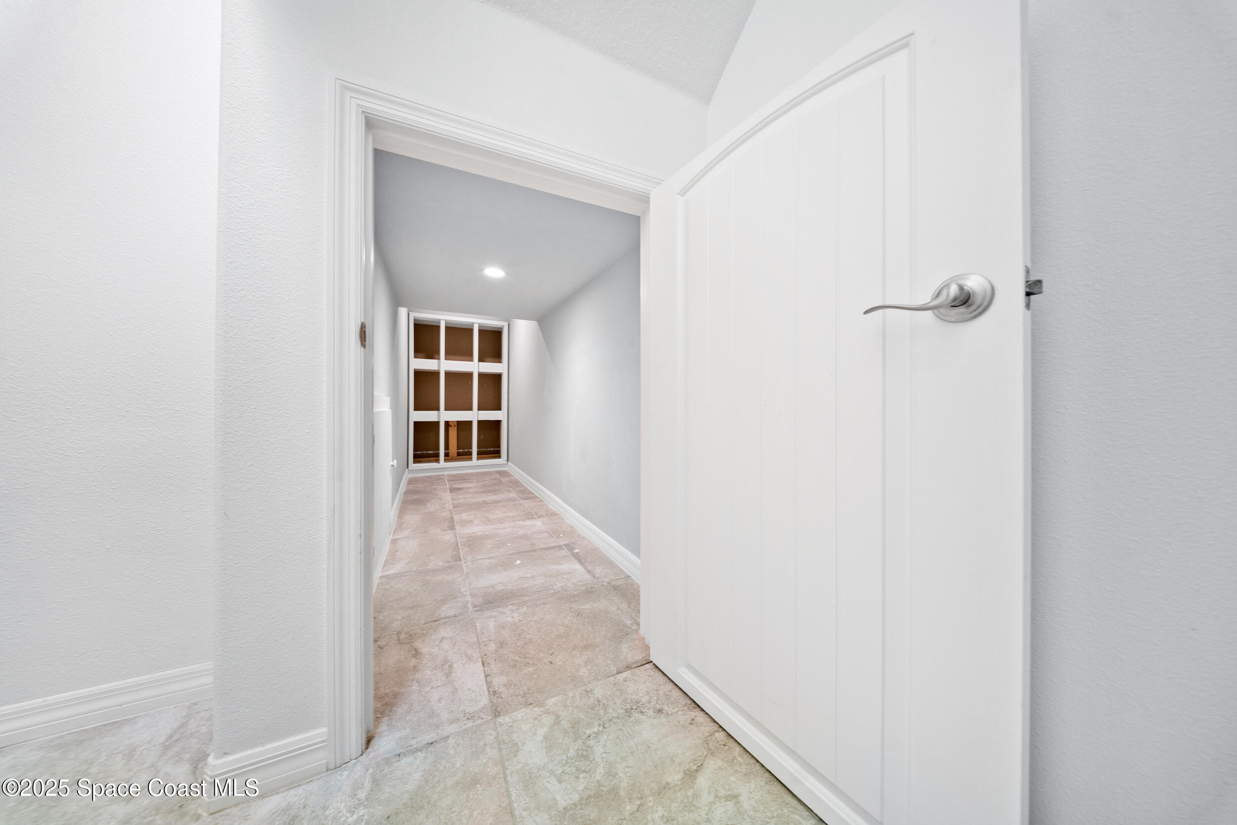 8830 Napolo Drive Melbourne, FL 32940 - Photo 10 of 36 a view of a hallway