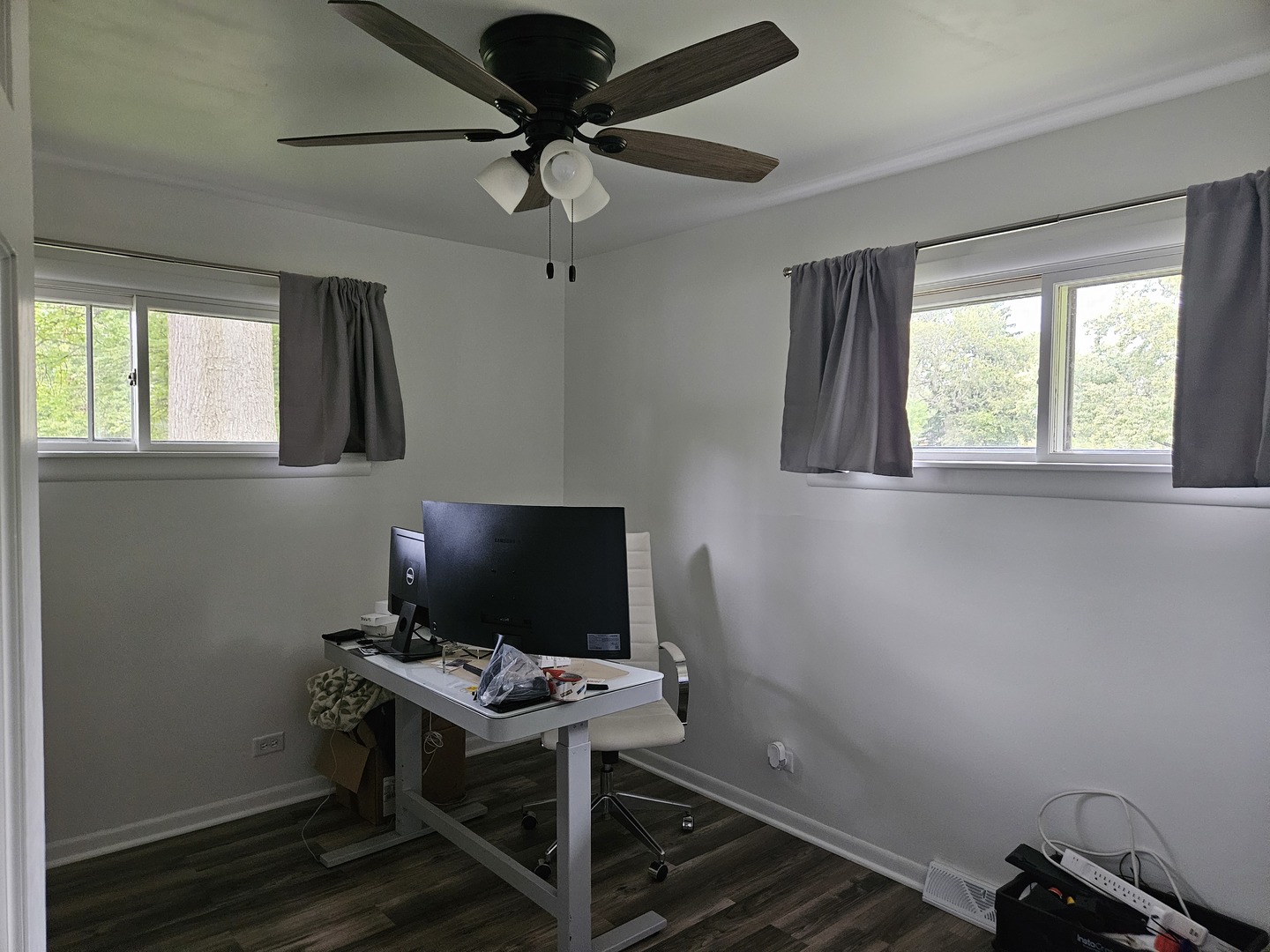 4-n055 Robbie Lane Addison, IL 60101 - Photo 7 of 9 a view of a workspace with furniture and a window