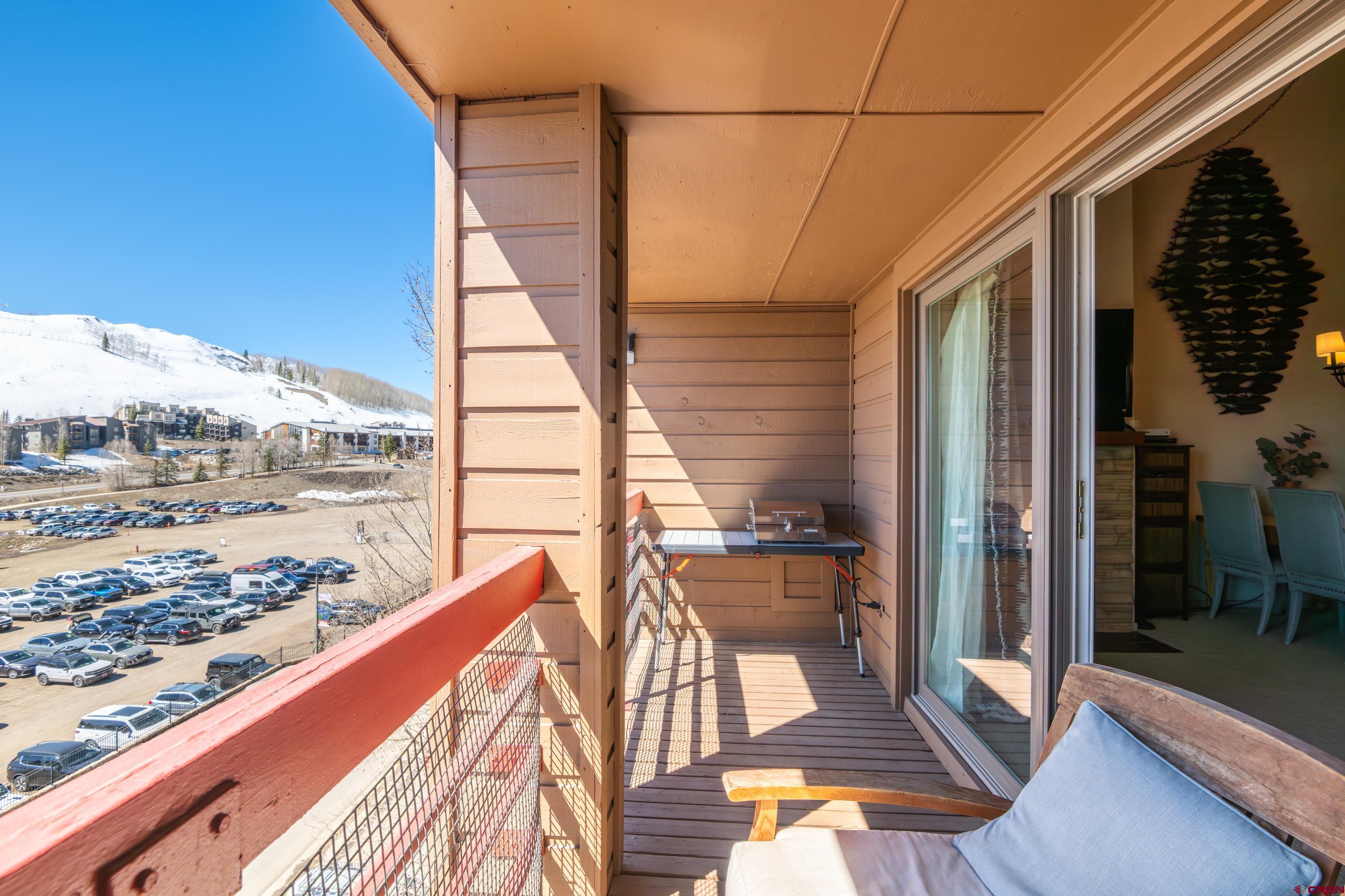 25 Emmons Road, Unit 41 Crested Butte, CO 81225 - Photo 13 of 45 a view of balcony with wooden floor
