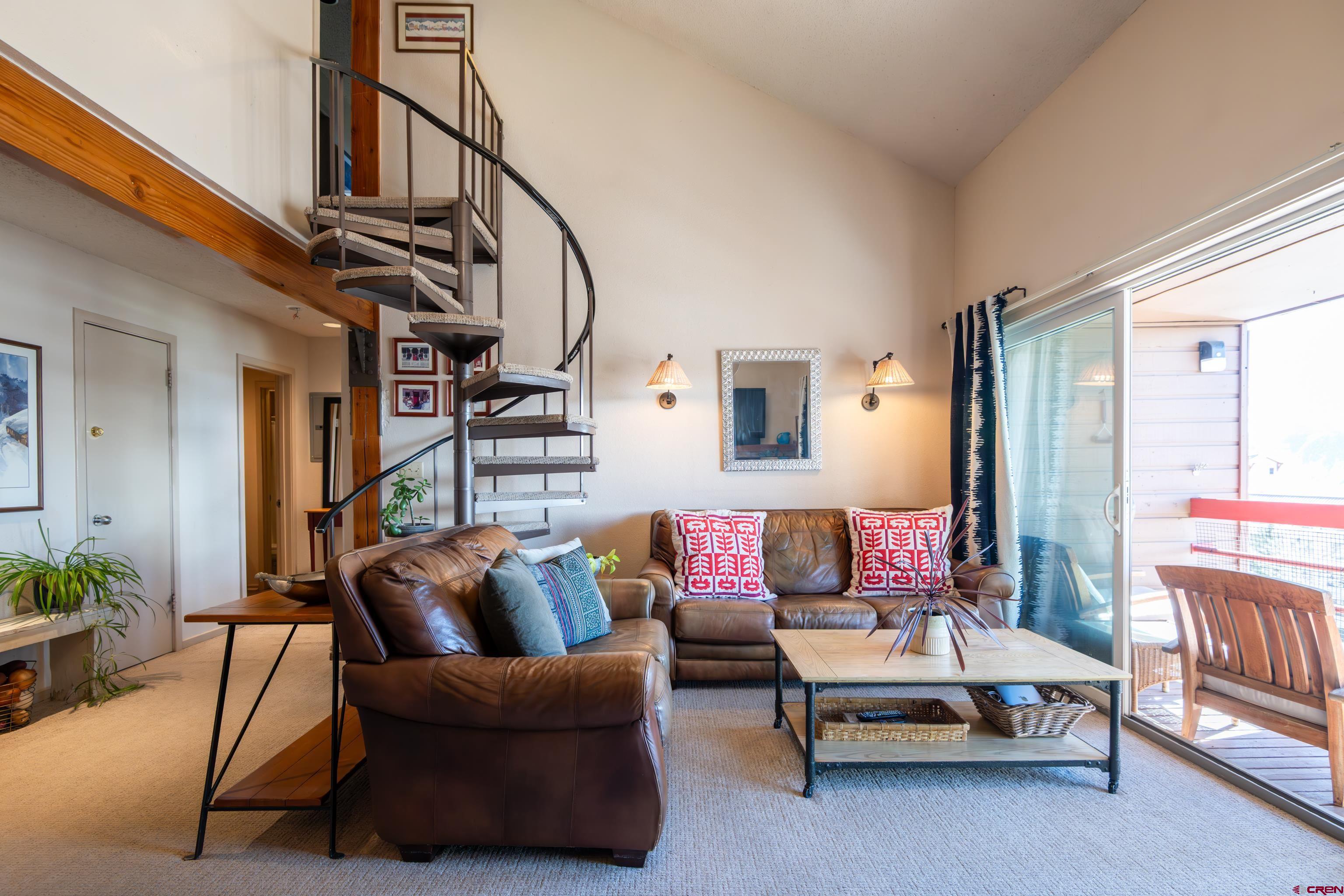 25 Emmons Road, Unit 41 Crested Butte, CO 81225 - Photo 14 of 45 a living room with furniture a rug and a window