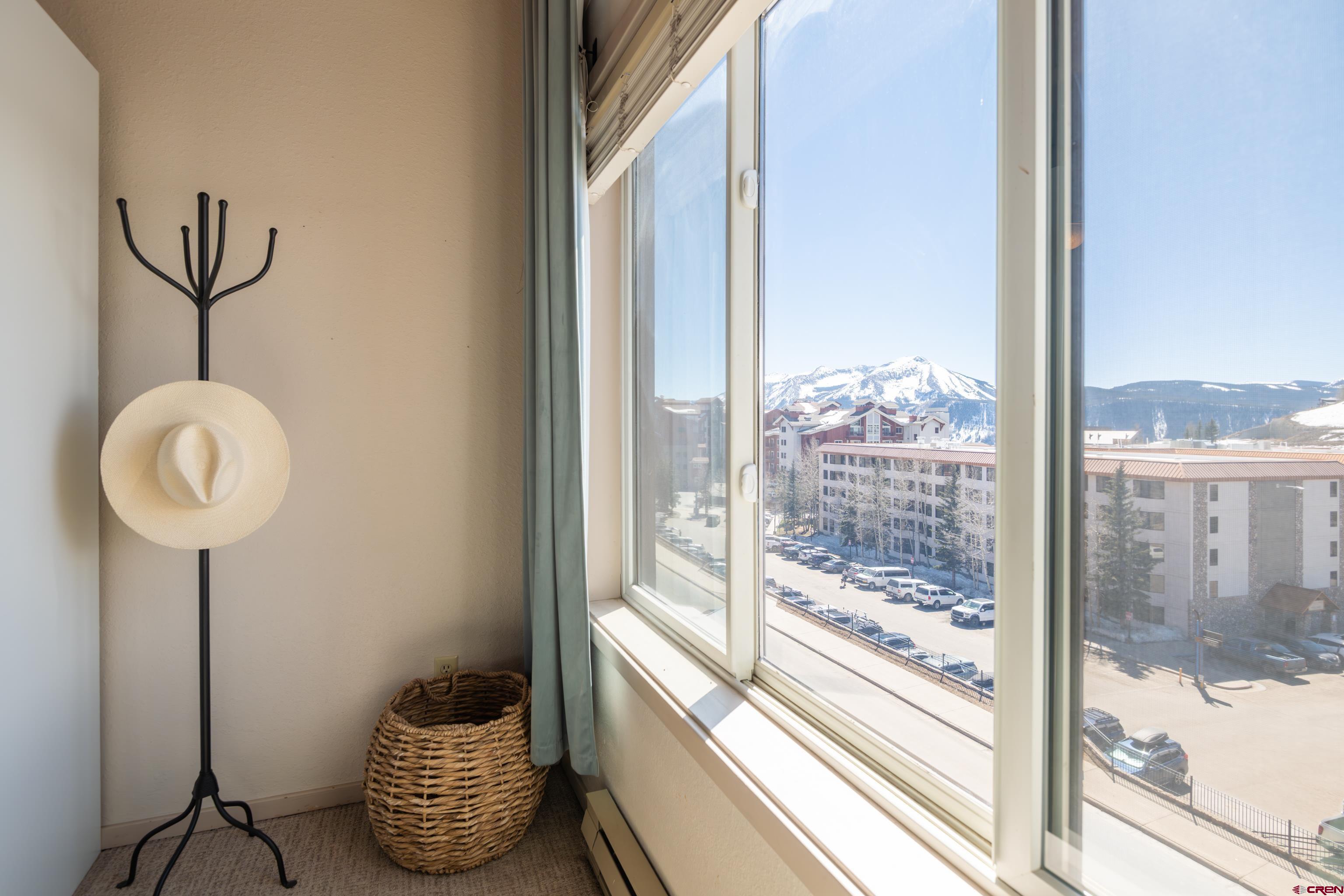 25 Emmons Road, Unit 41 Crested Butte, CO 81225 - Photo 18 of 45 a room with filled with furniture and a floor to ceiling window
