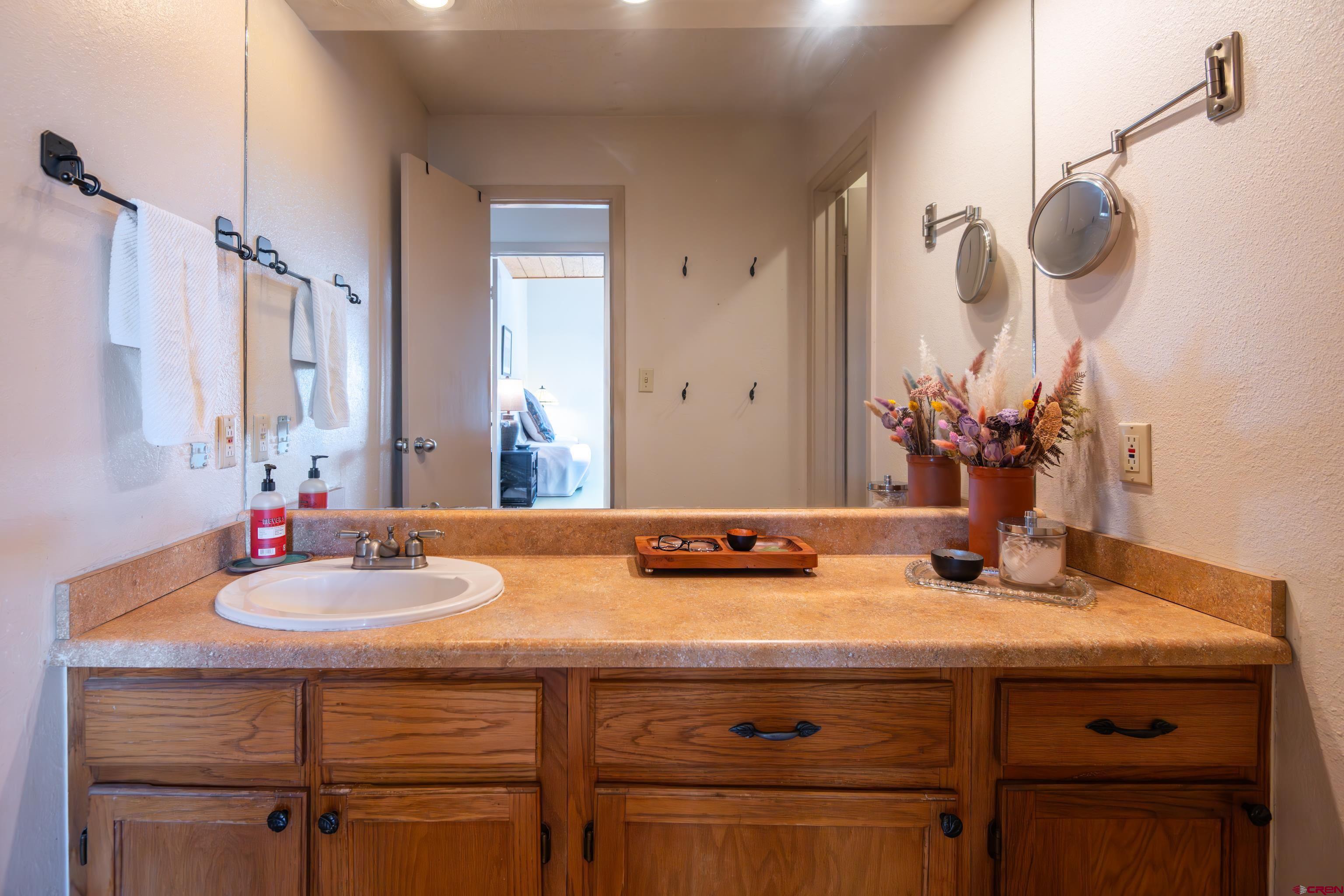 25 Emmons Road, Unit 41 Crested Butte, CO 81225 - Photo 24 of 45 a bathroom with a sink and a mirror
