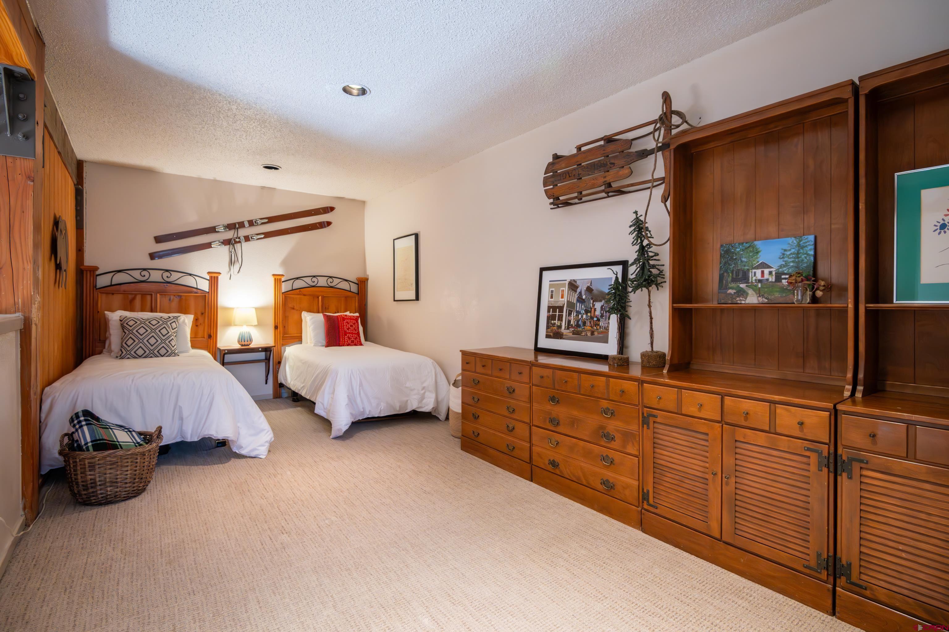 25 Emmons Road, Unit 41 Crested Butte, CO 81225 - Photo 27 of 45 a bedroom with bed and window