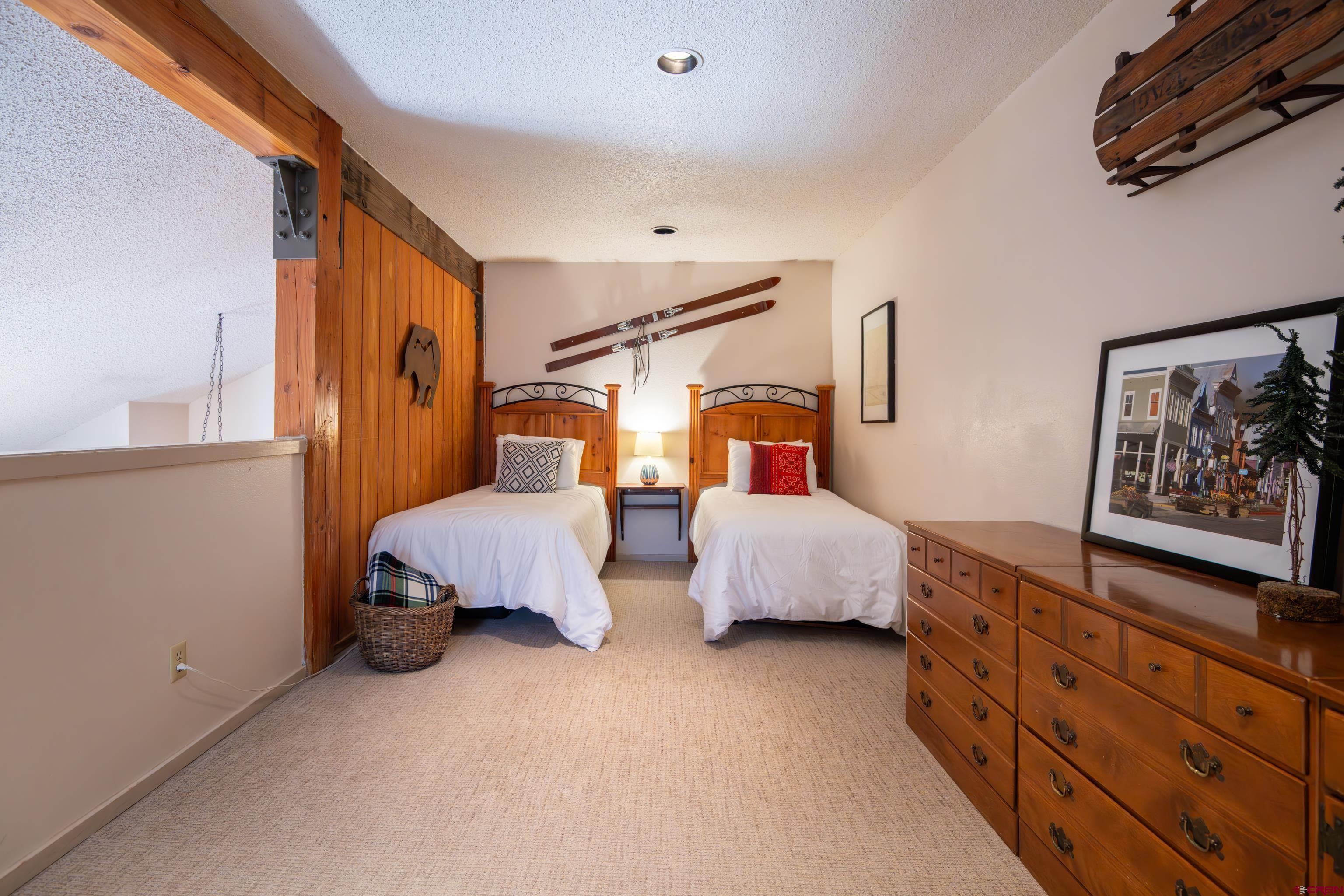 25 Emmons Road, Unit 41 Crested Butte, CO 81225 - Photo 28 of 45 a bedroom with bed and a window