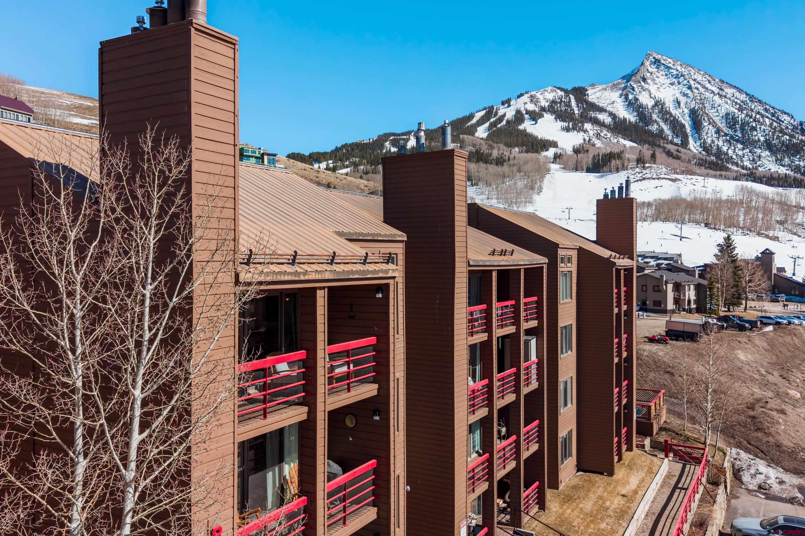 25 Emmons Road, Unit 41 Crested Butte, CO 81225 - Photo 36 of 45 a city street lined with tall buildings