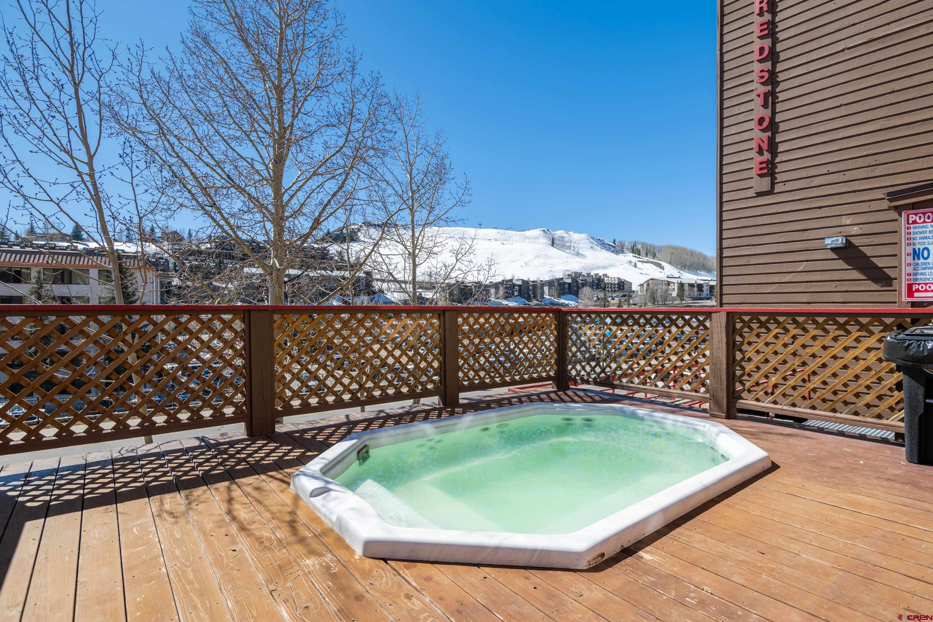 25 Emmons Road, Unit 41 Crested Butte, CO 81225 - Photo 40 of 45 a small pool with tall buildings
