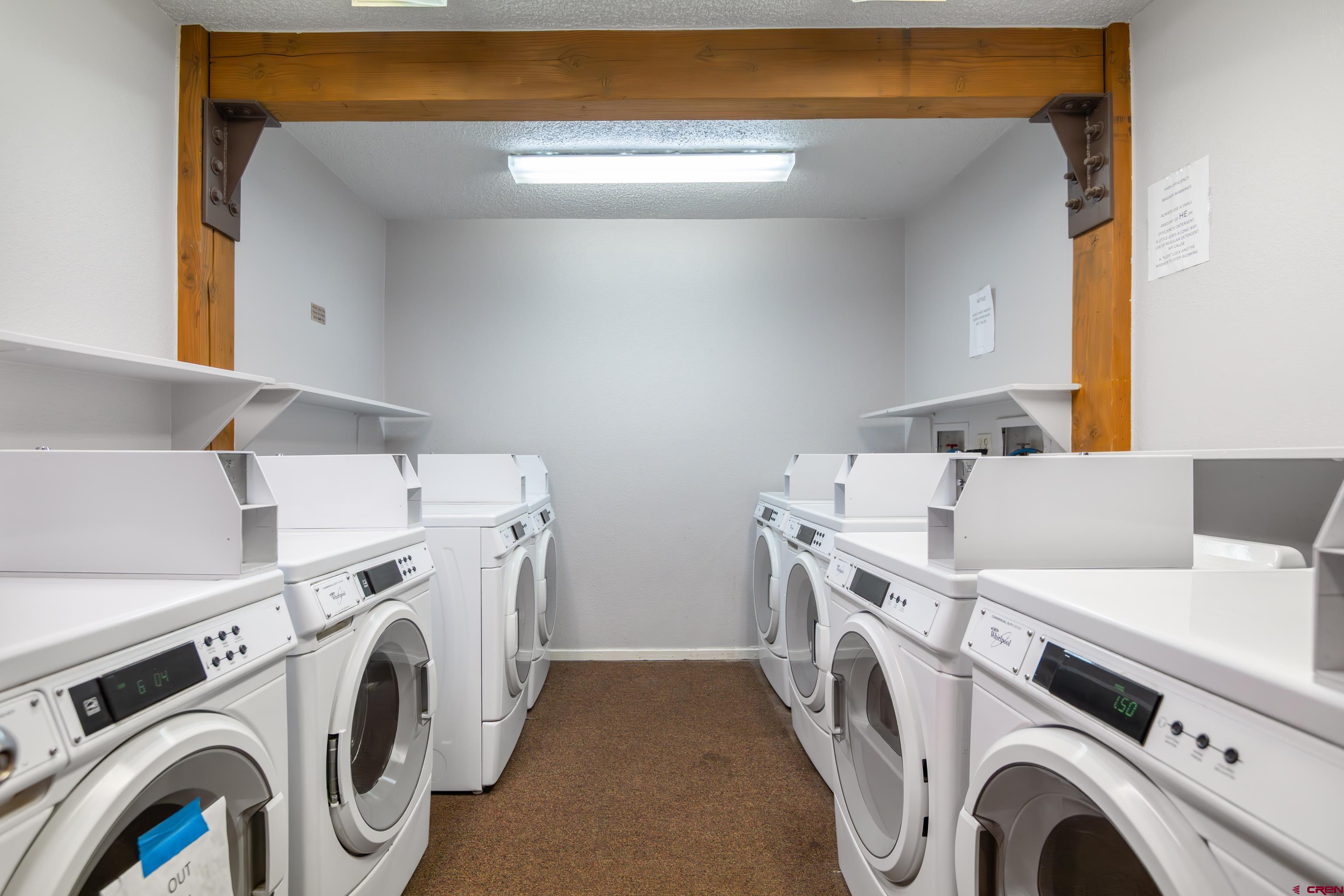 25 Emmons Road, Unit 41 Crested Butte, CO 81225 - Photo 41 of 45 a utility room with dryer and washer