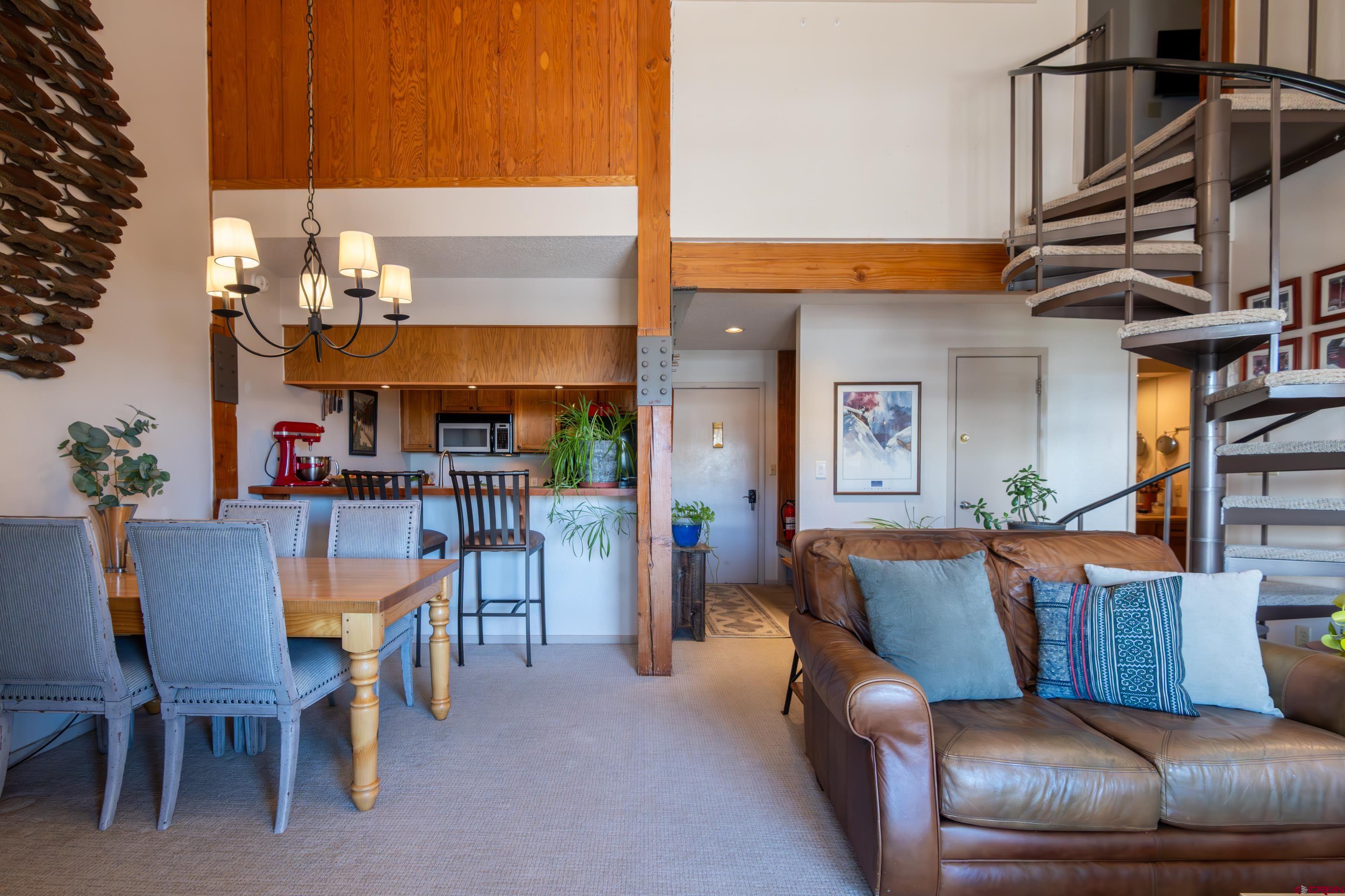 25 Emmons Road, Unit 41 Crested Butte, CO 81225 - Photo 7 of 45 a view of a dining room with furniture