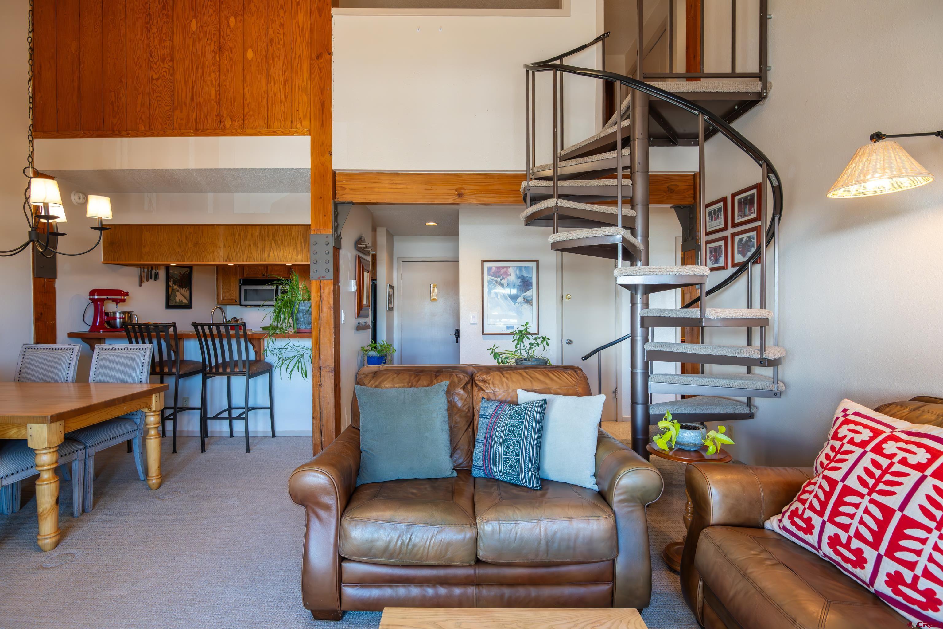 25 Emmons Road, Unit 41 Crested Butte, CO 81225 - Photo 10 of 45 a living room with furniture