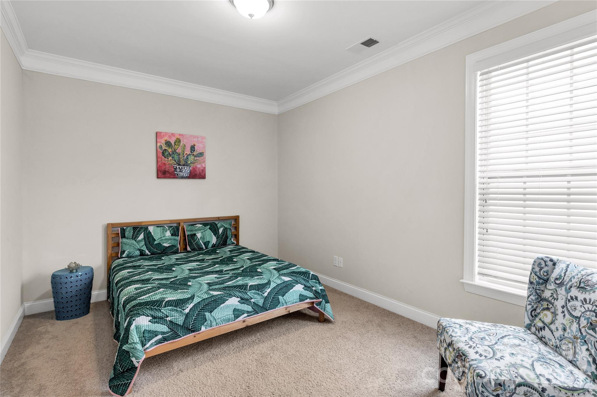 1372 Rainier Drive Fort Mill, SC 29708 - Photo 20 of 48 a bedroom with a bed and a couch