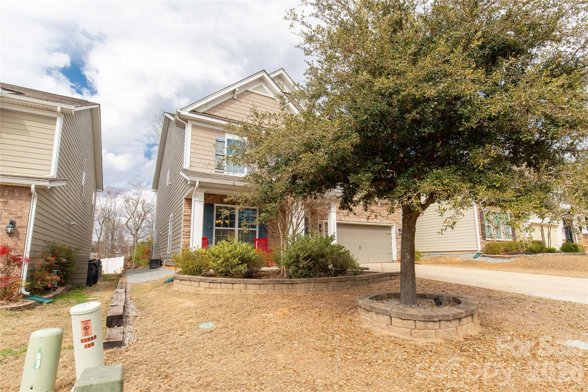 1372 Rainier Drive Fort Mill, SC 29708 - Photo 2 of 48 a front view of a building with trees