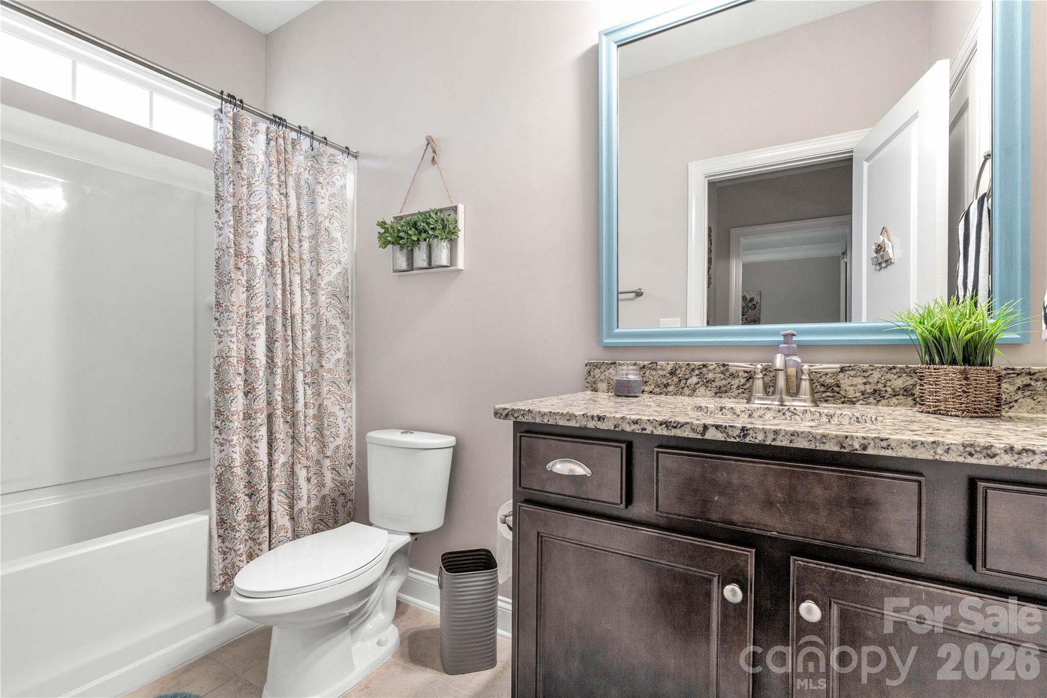 1372 Rainier Drive Fort Mill, SC 29708 - Photo 22 of 48 a bathroom with a granite countertop sink toilet and shower