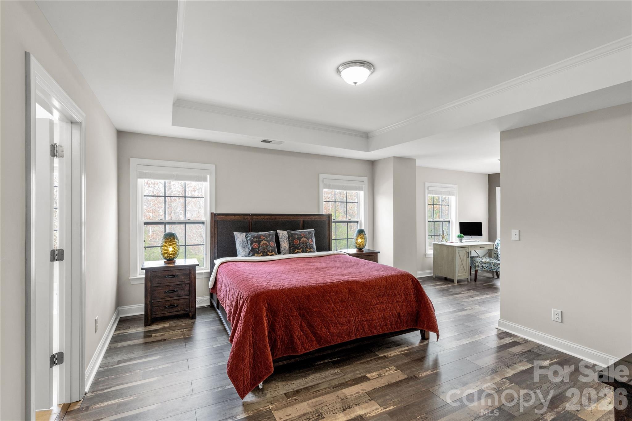 1372 Rainier Drive Fort Mill, SC 29708 - Photo 23 of 48 a bedroom with a bed and wooden floor