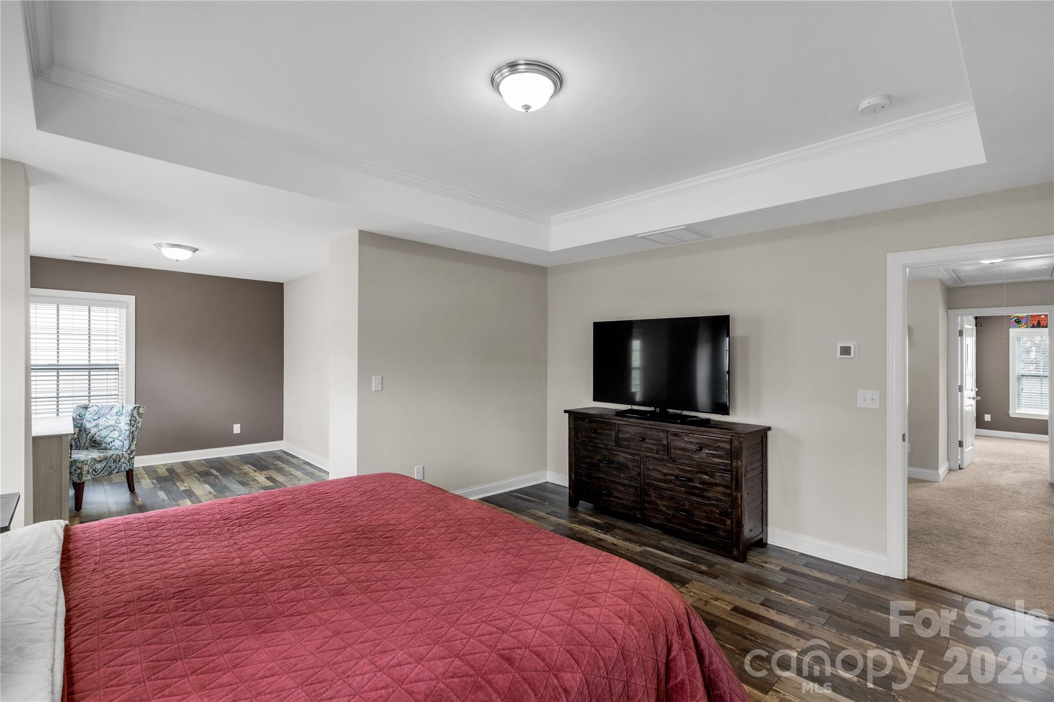 1372 Rainier Drive Fort Mill, SC 29708 - Photo 24 of 48 a bedroom with a bed and a flat screen tv