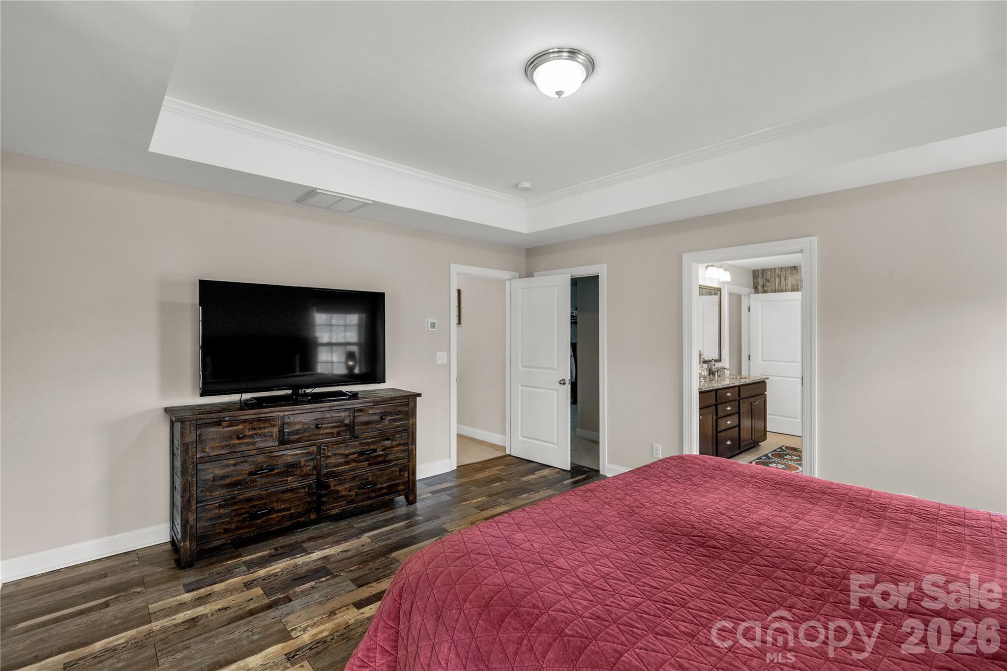 1372 Rainier Drive Fort Mill, SC 29708 - Photo 25 of 48 a bedroom with a bed and a flat screen tv