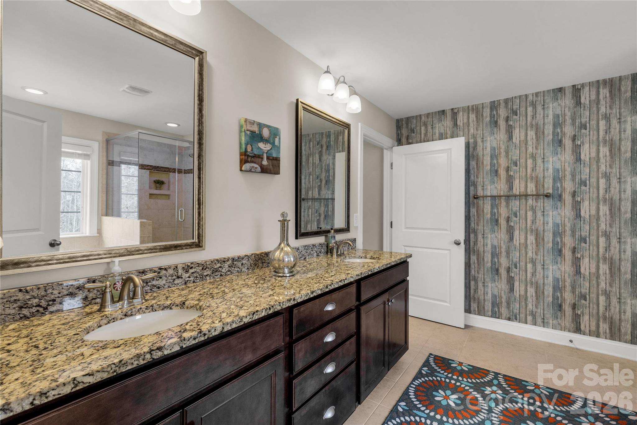 1372 Rainier Drive Fort Mill, SC 29708 - Photo 27 of 48 a bathroom with a granite countertop sink and a mirror