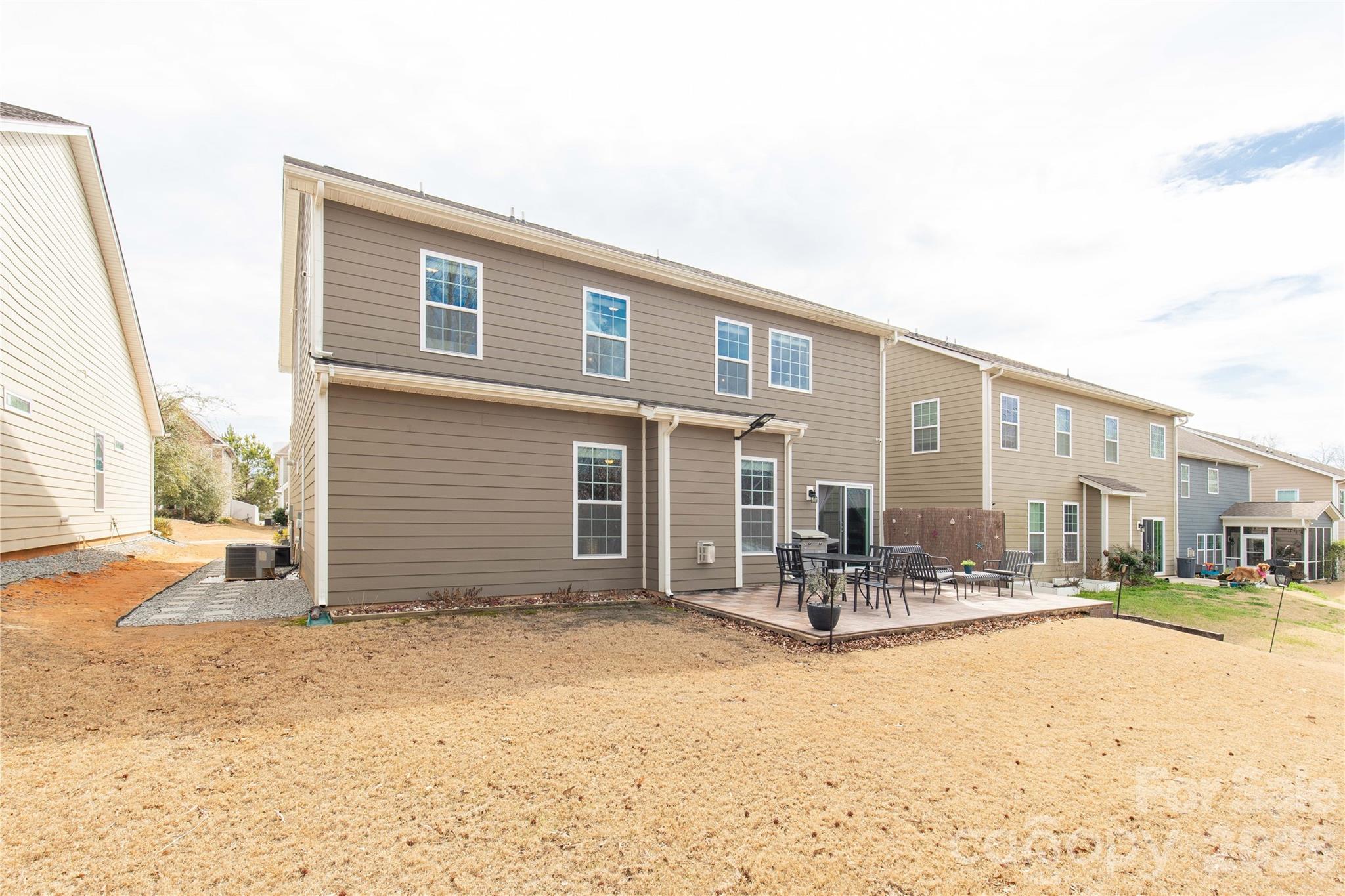 1372 Rainier Drive Fort Mill, SC 29708 - Photo 40 of 48 a view of a house with wooden walls