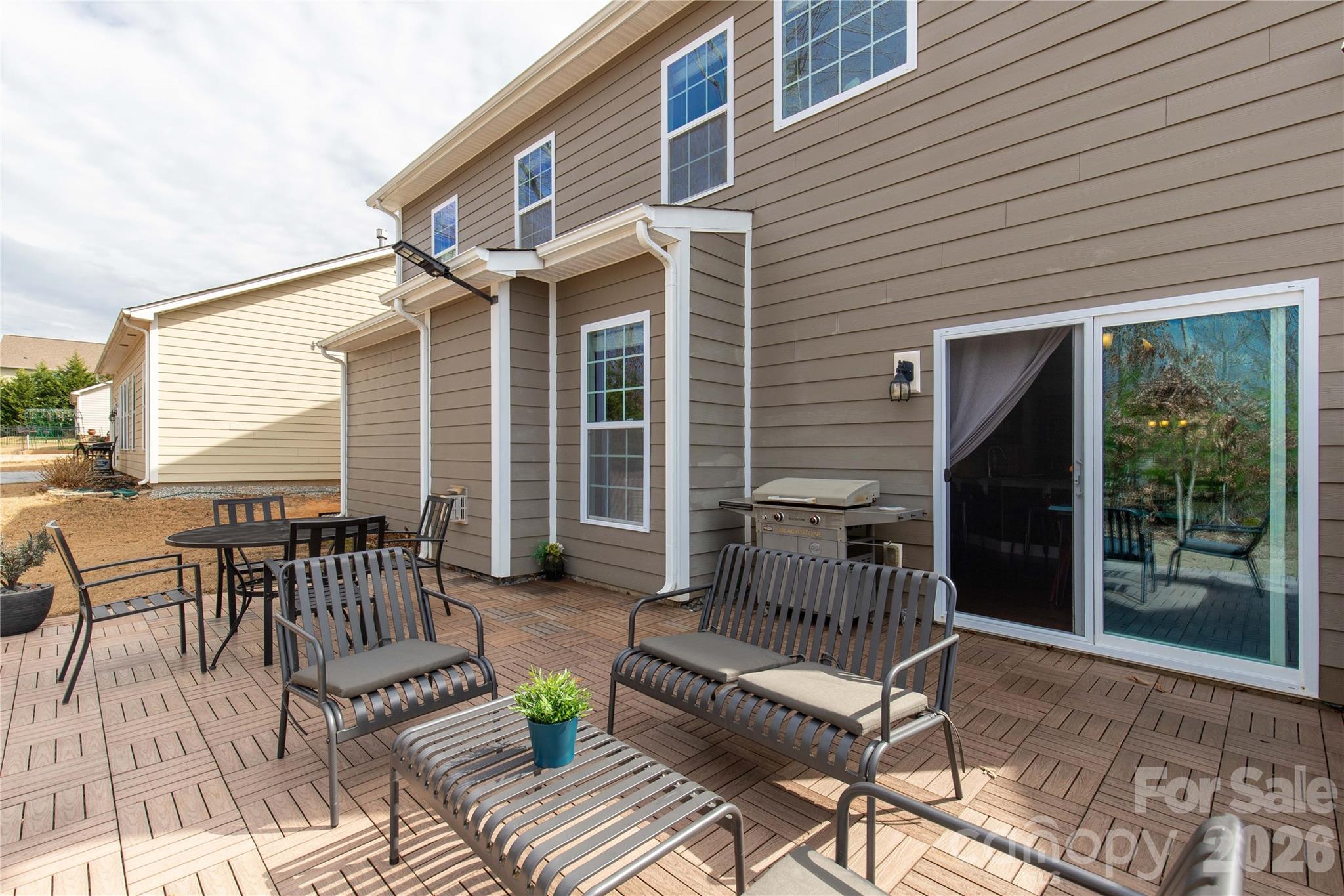 1372 Rainier Drive Fort Mill, SC 29708 - Photo 42 of 48 a view of a patio with a table and chairs