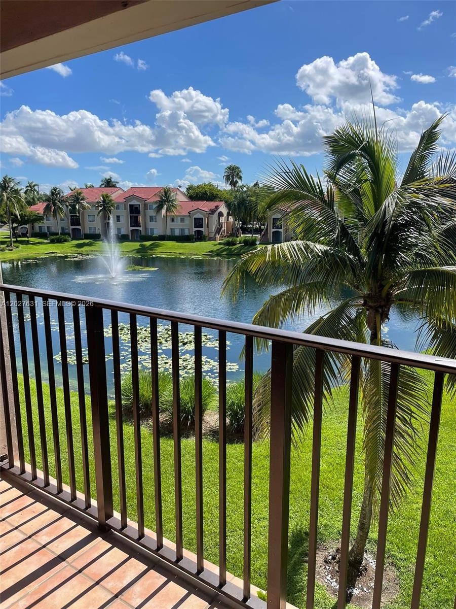 2081 Renaissance Boulevard, Unit 306 Miramar, FL 33025 - Photo 5 of 22 a view of a balcony with lake view