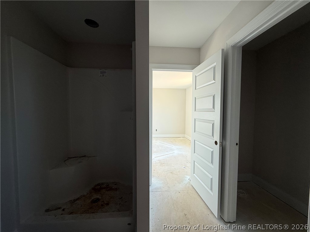 178 Brickendon Lane Raeford, NC 28376 - Photo 13 of 15 a bathroom with a glass shower door
