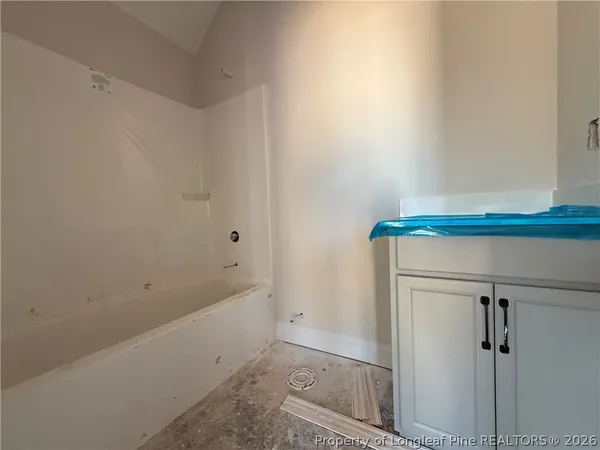 a bathroom with a bathtub