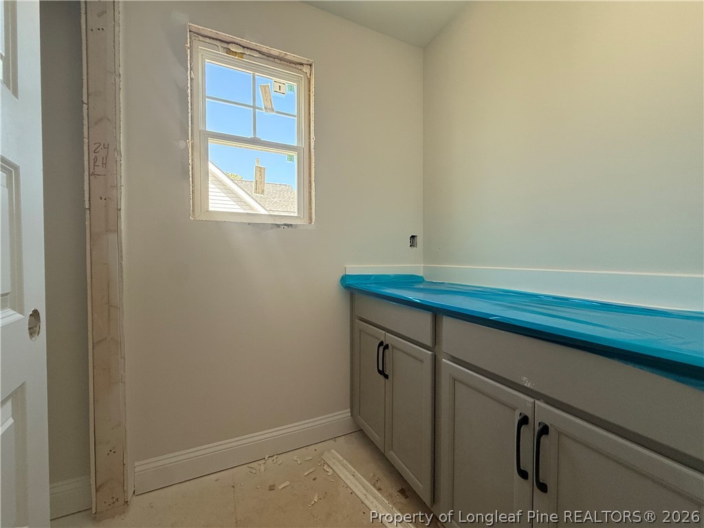 178 Brickendon Lane Raeford, NC 28376 - Photo 8 of 15 a bathroom with a sink and a window
