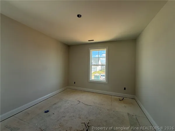a view of an empty room with window