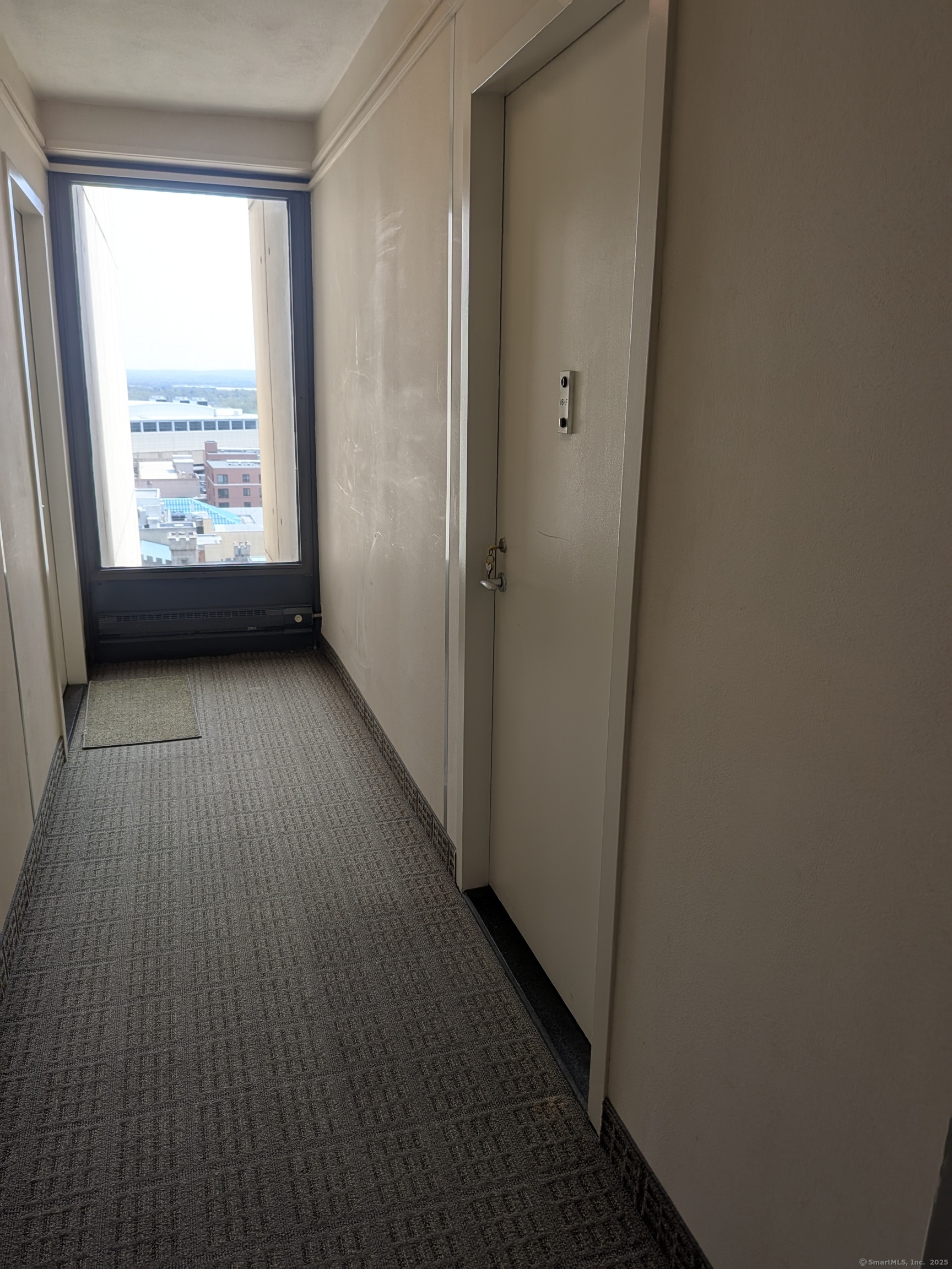 1 Gold Street, Unit 16F Hartford, CT 06103 - Photo 13 of 20 an empty room with windows