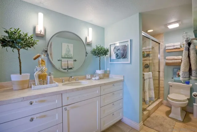 a view of a backyard with a patio and fire pit