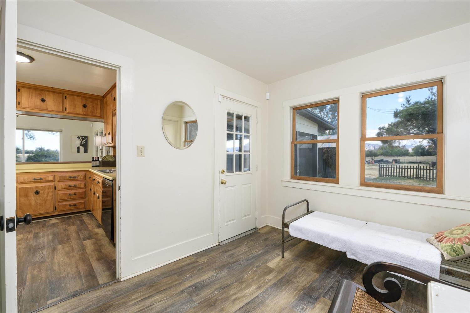 28968 County Road 26 Winters, CA 95694 - Photo 16 of 35 a view of a bedroom with wooden floor and a window