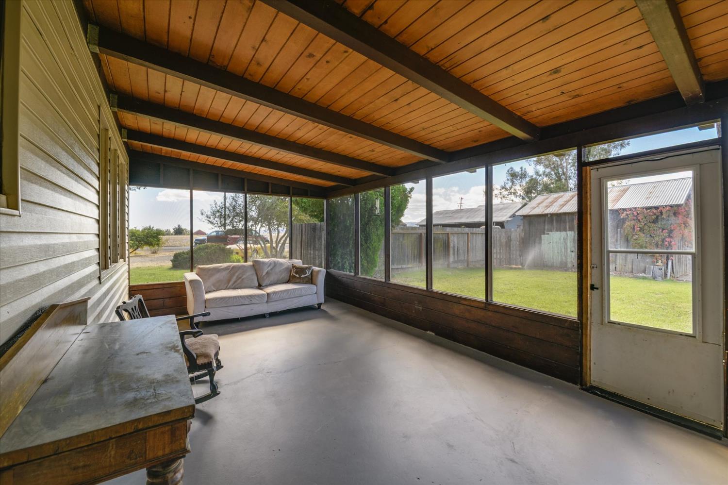 28968 County Road 26 Winters, CA 95694 - Photo 27 of 35 a view of a porch with furniture and a backyard