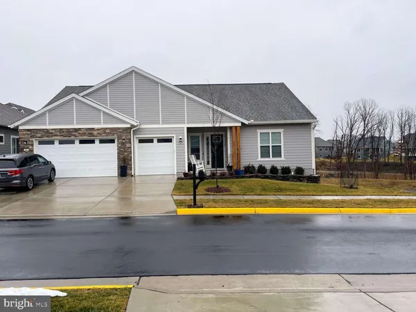 a view of a house with swimming pool