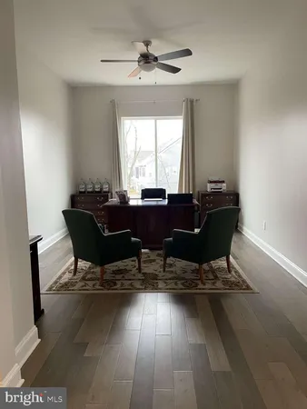 a workspace with furniture and window