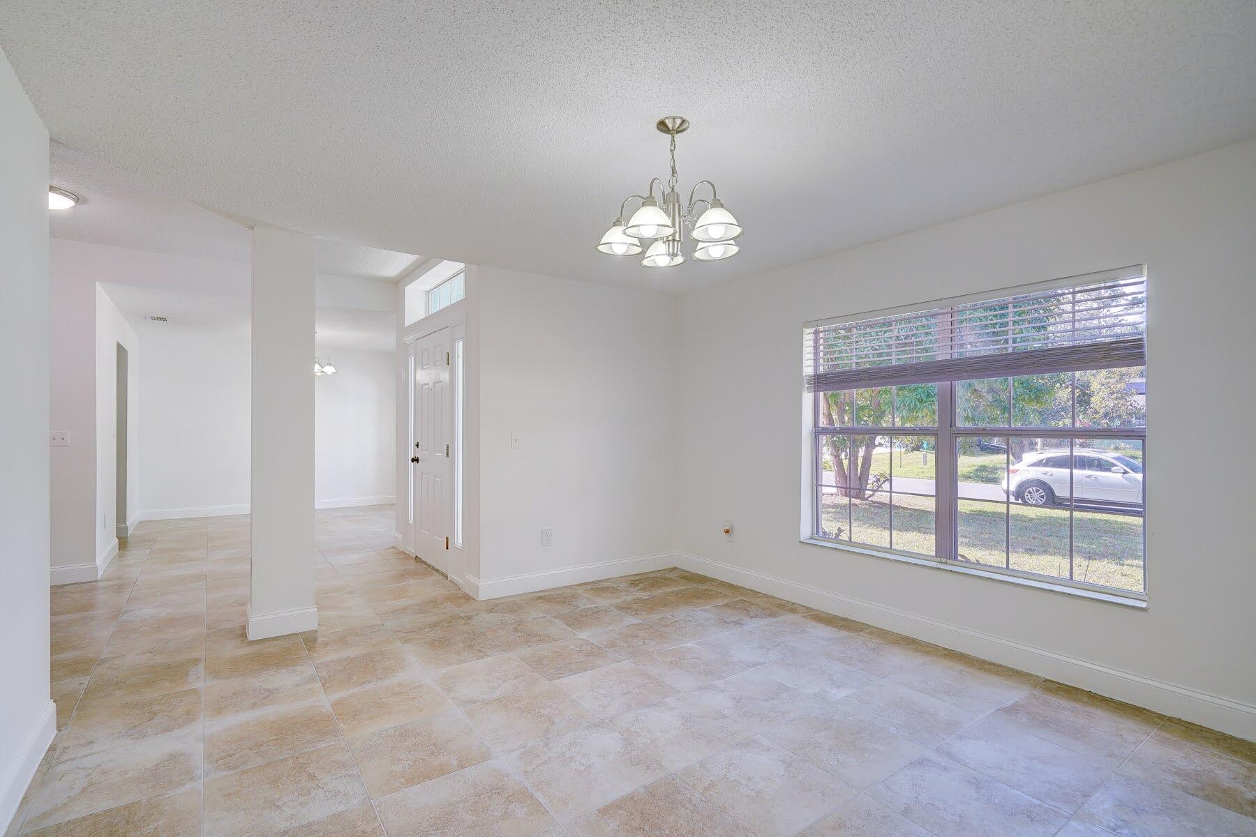 2643 Southwest Ace Road Port St. Lucie, FL 34953 - Photo 7 of 42 Living Room