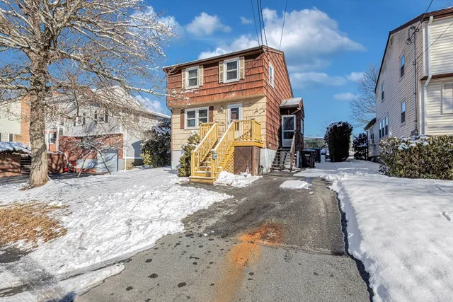 a view of a house with a snow