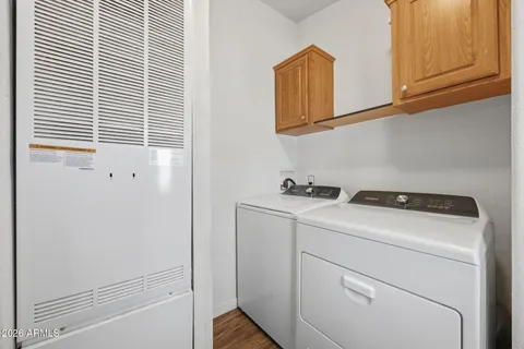 a balcony view with a seating space