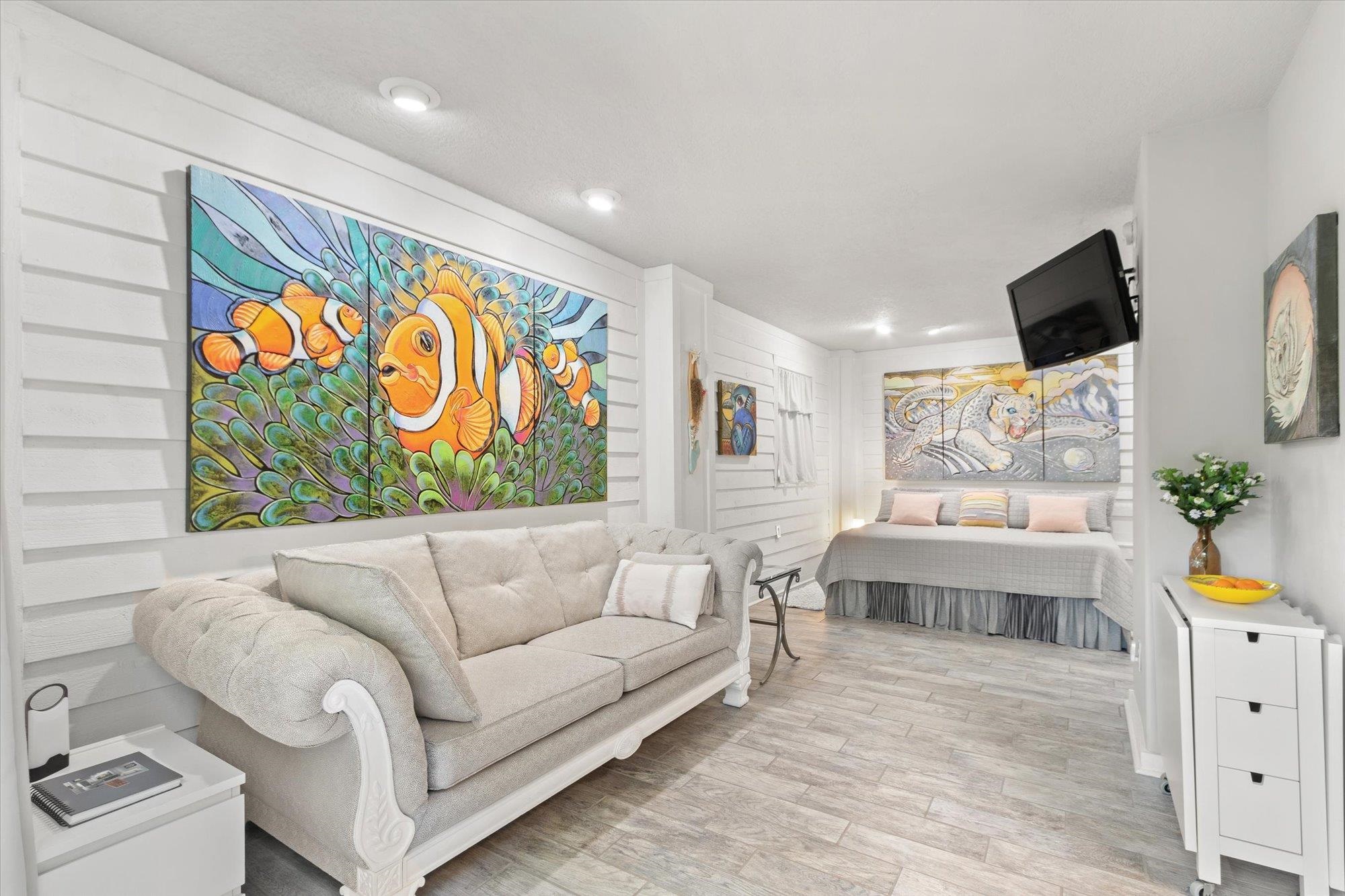 1685 Santander Street St. Augustine, FL 32080 - Photo 21 of 48 a living room with furniture and a flat screen tv