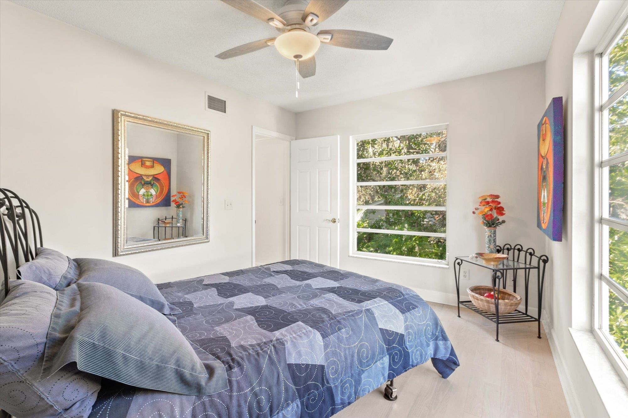 1685 Santander Street St. Augustine, FL 32080 - Photo 31 of 48 a bedroom with a bed and a window