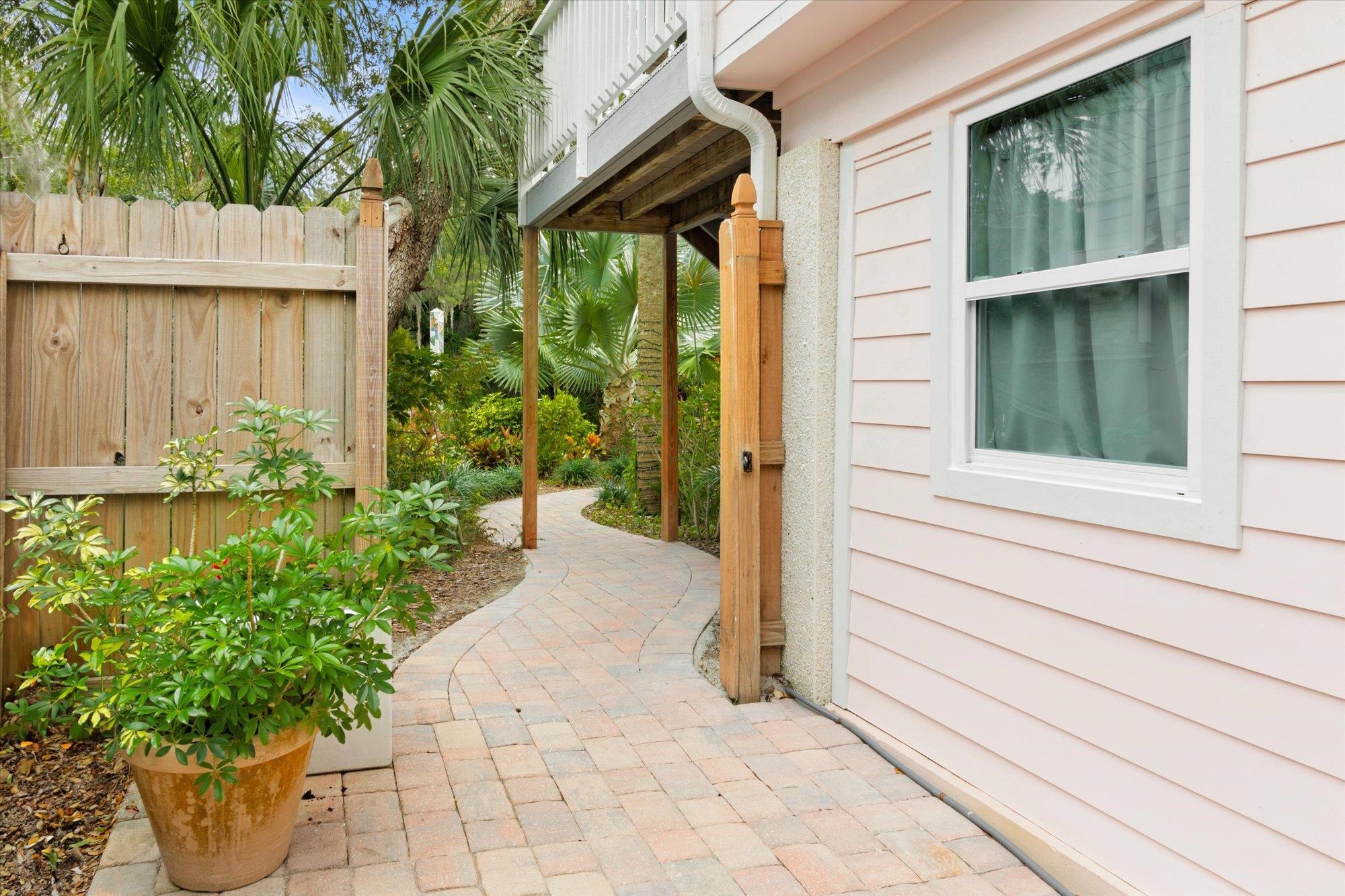 1685 Santander Street St. Augustine, FL 32080 - Photo 39 of 48 a couple of potted plants in front of door