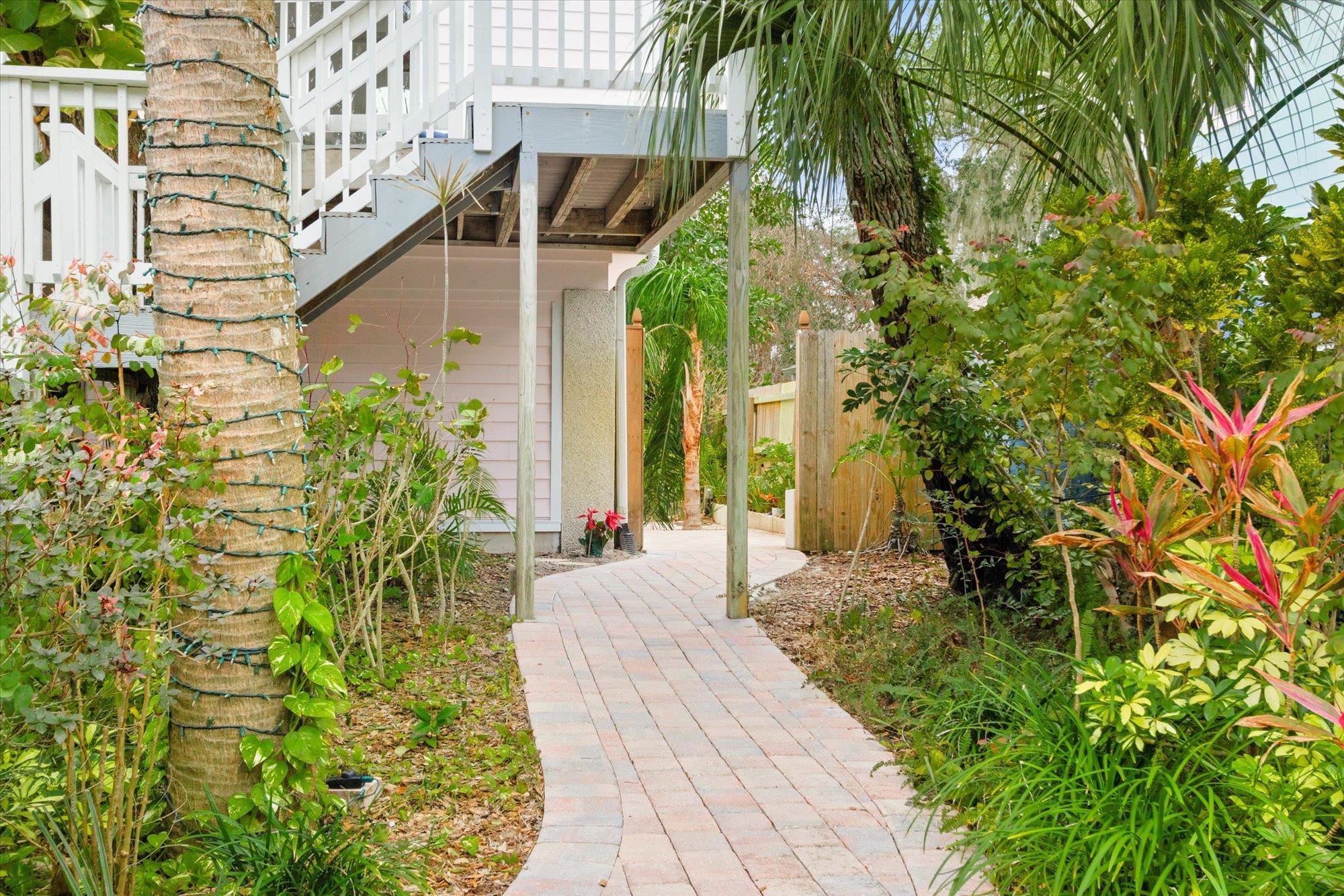 1685 Santander Street St. Augustine, FL 32080 - Photo 40 of 48 a front view of a house with a yard