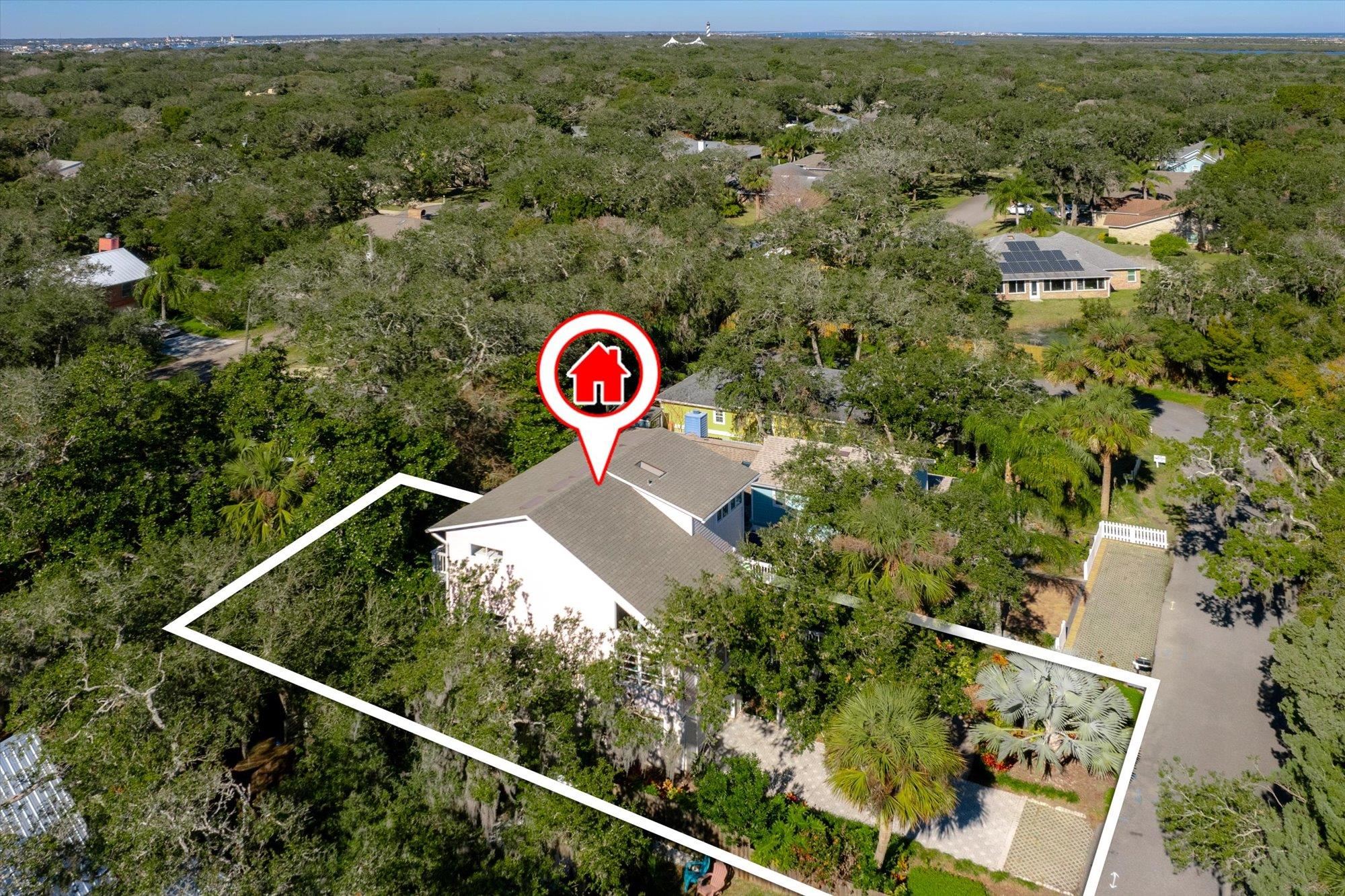 1685 Santander Street St. Augustine, FL 32080 - Photo 47 of 48 an aerial view of residential house with outdoor space and trees all around