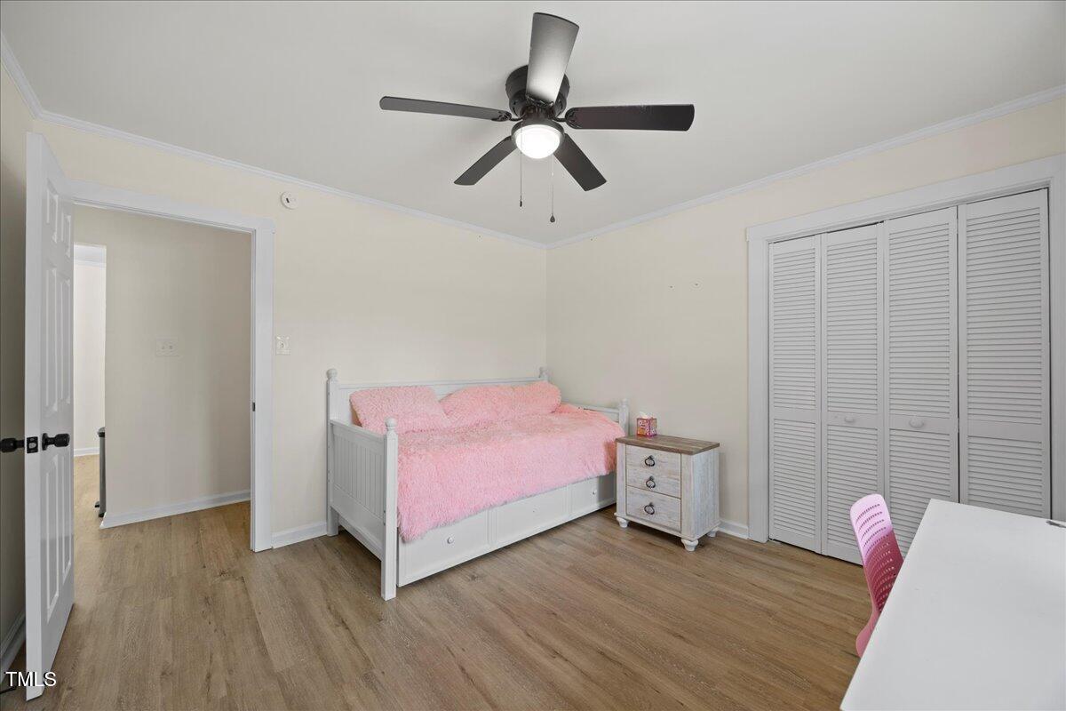 2013 Dartmouth Drive Durham, NC 27705 - Photo 20 of 32 a living room with furniture and a wooden floor