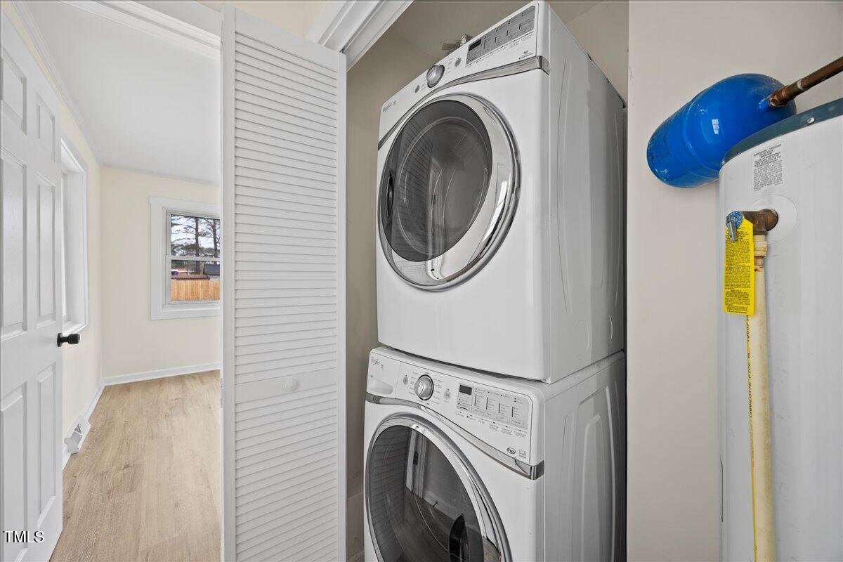 2013 Dartmouth Drive Durham, NC 27705 - Photo 23 of 32 a utility room with dryer and washer