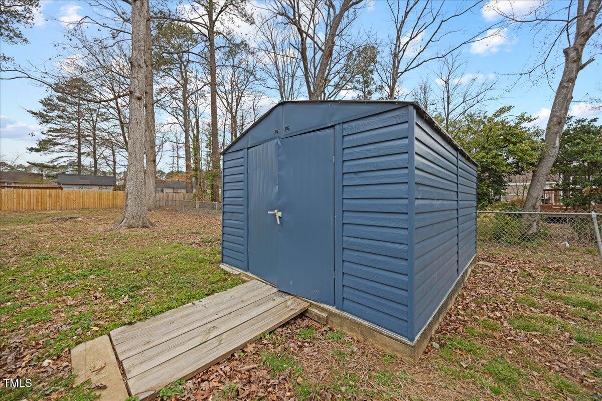2013 Dartmouth Drive Durham, NC 27705 - Photo 31 of 32 a view of a backyard with wooden fence