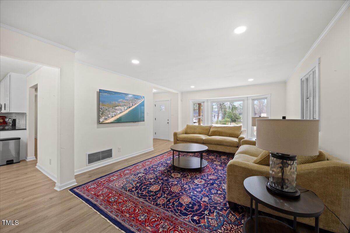 2013 Dartmouth Drive Durham, NC 27705 - Photo 6 of 32 a living room with furniture and a couch