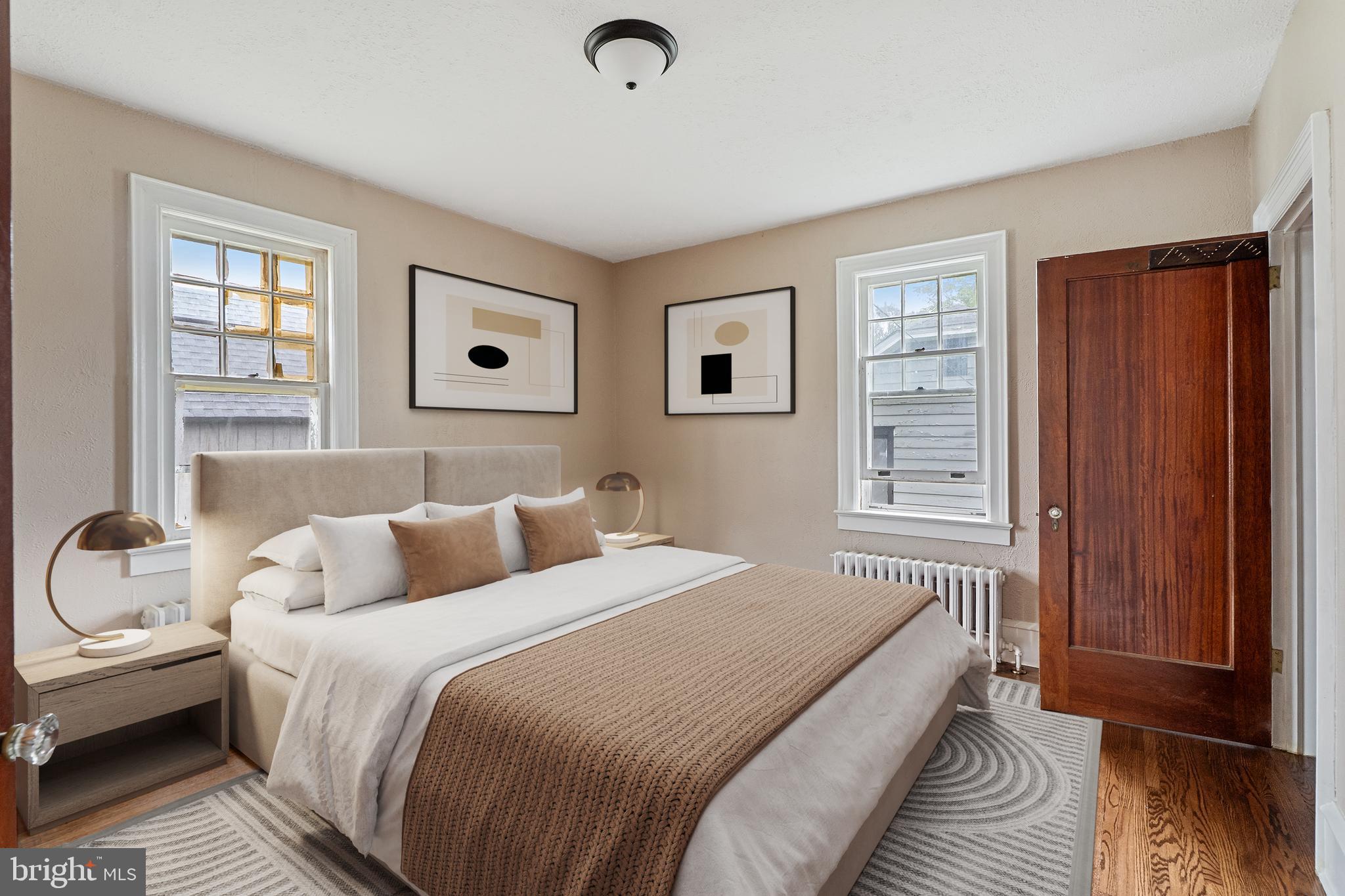 414 Main Street Dorchester, NJ 08316 - Photo 3 of 22 a bedroom with a bed and wooden floor